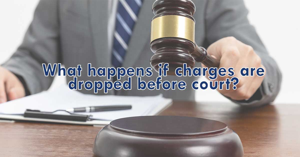 What happens if charges are dropped before court