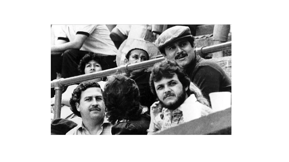 Pablo Escobar left and Jorge Luis Ochoa wearing hat jpg